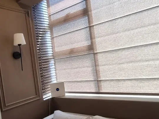 Natural roman blind in a Cape Town lounge