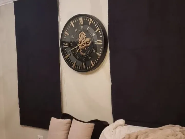 Black roman blinds in a Cape Town lounge